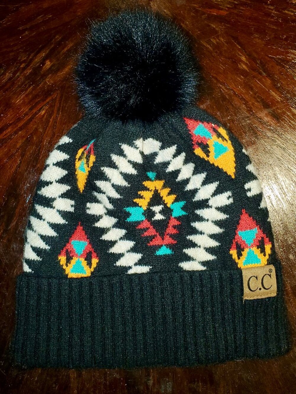 C.C. black knit pom-pom beanie